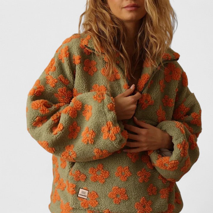 Warm & stylish women's floral quarter-zip sweater, an essential cozy pullover for comfort.