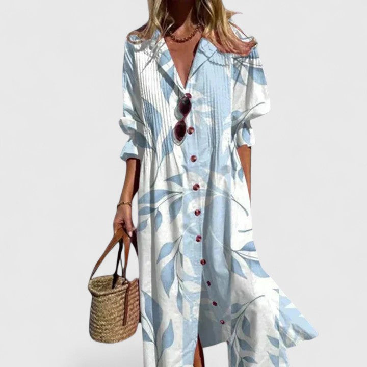 Women's floral print shirtdress, pintuck pleated midi with a collared V-neck and button-down front. Chic summer fashion.