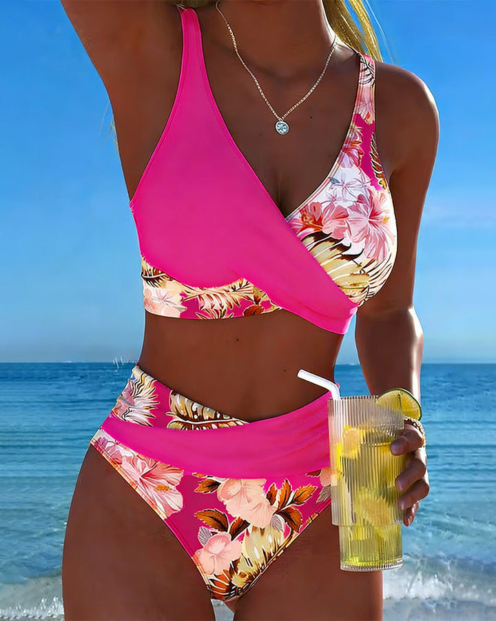 Stylish women's floral print split bikini, showcasing a vibrant summer beach fashion.