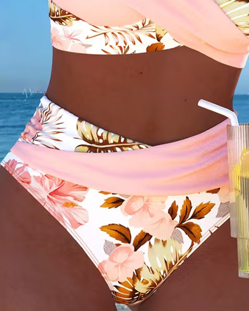 Vibrant floral print women's split bikini, ideal summer fashion beachwear outfit.