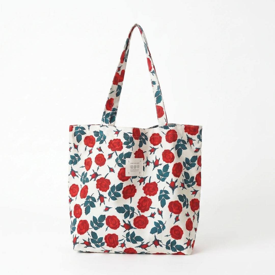 Women's floral print tote bag, a spacious shoulder bag & fashion accessory for summer travel.