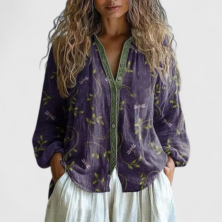 Women's floral print zip-front blouse with long sleeves, perfect for boho chic or casual everyday style.