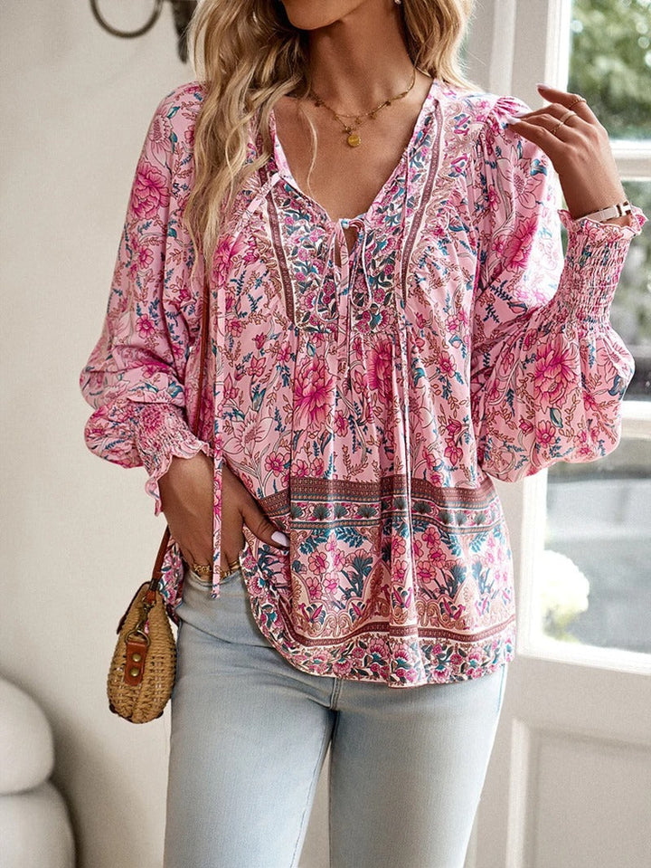Women's floral puff sleeve summer top, lightweight & elegant, perfect for casual wear or vacation.