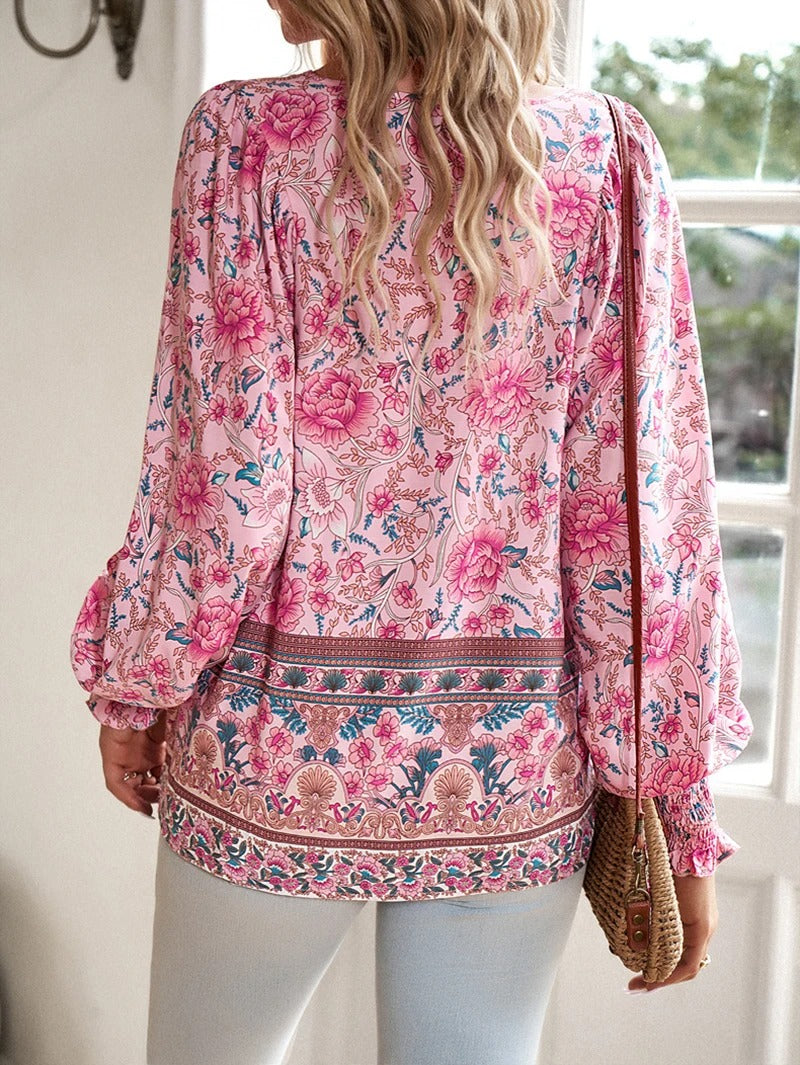 Enjoy summer style with this women's floral puff sleeve top, lightweight & perfect for vacations.