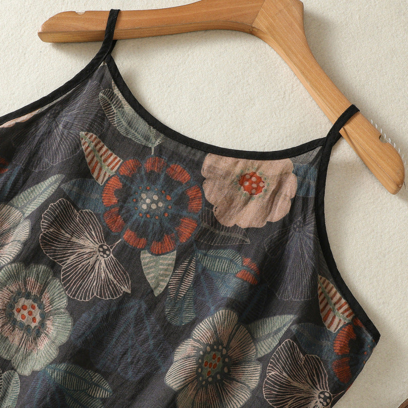 Elegant women's sleeveless floral slip dress with relaxed fit & spaghetti straps. Ideal comfortable day dress for summer.