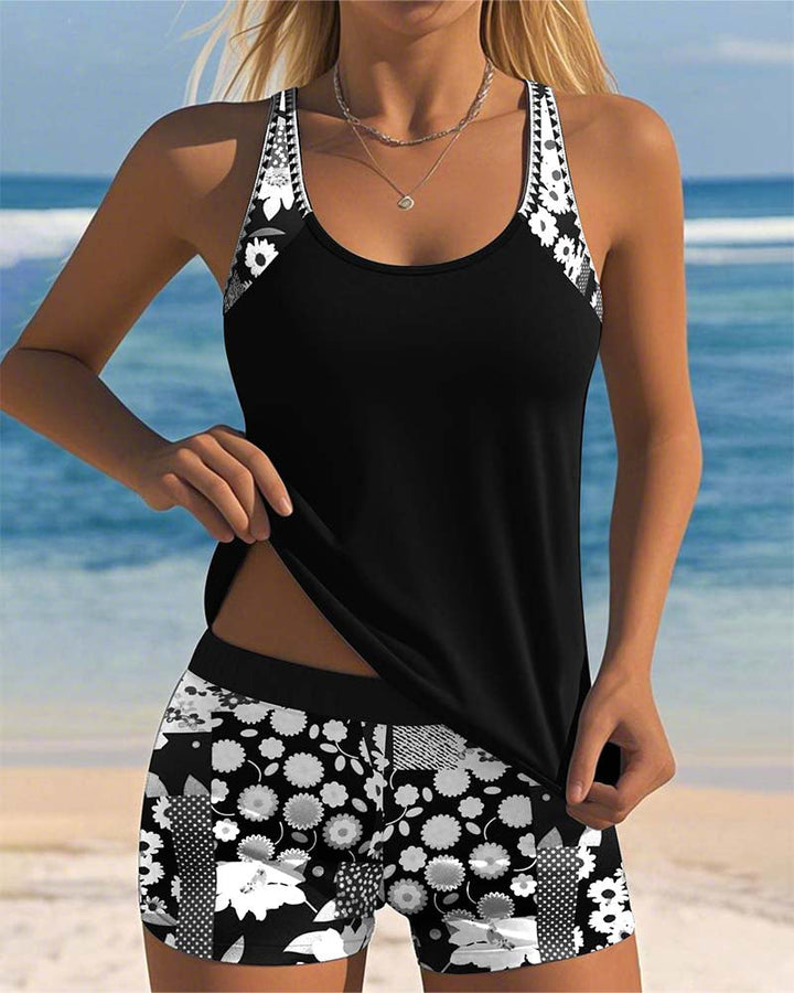 Women's vibrant floral print tankini top & matching swim shorts, modest summer beachwear perfect for vacation.