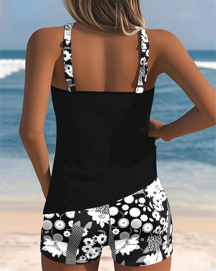 Plus size friendly women's floral tankini swimsuit with comfortable swim shorts for a perfect beach vacation.