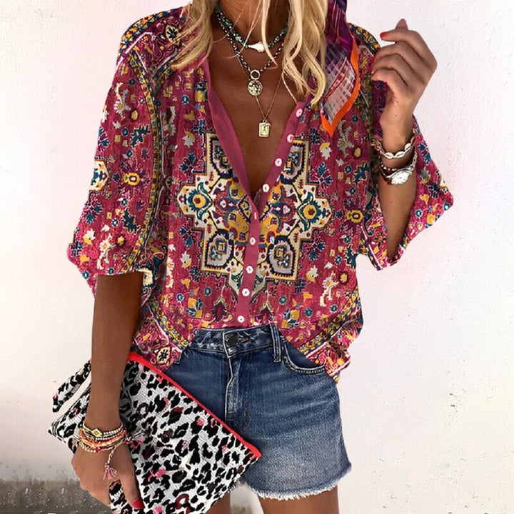 Relaxed fit floral printed V-neck blouse for women, short sleeve, button front. Great for everyday bohemian style.