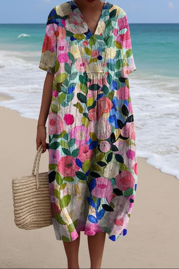 Women's floral V-neck midi dress for effortless summer style. Perfect flowy vacation wear & casual day dress.