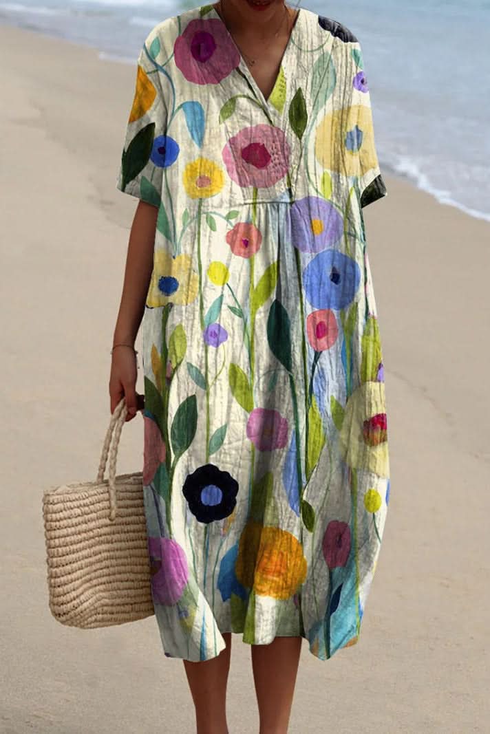 Comfortable women's floral midi dress with a V-neck, a perfect flowy summer dress for casual days or vacation.