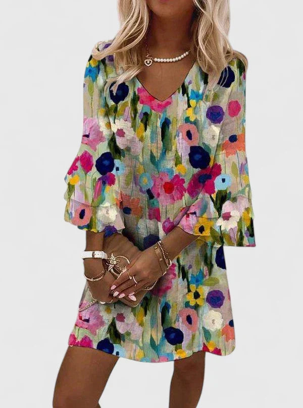 Women's floral V-neck mini dress with ruffle sleeves, perfect for summer casual outings or vacation wear.