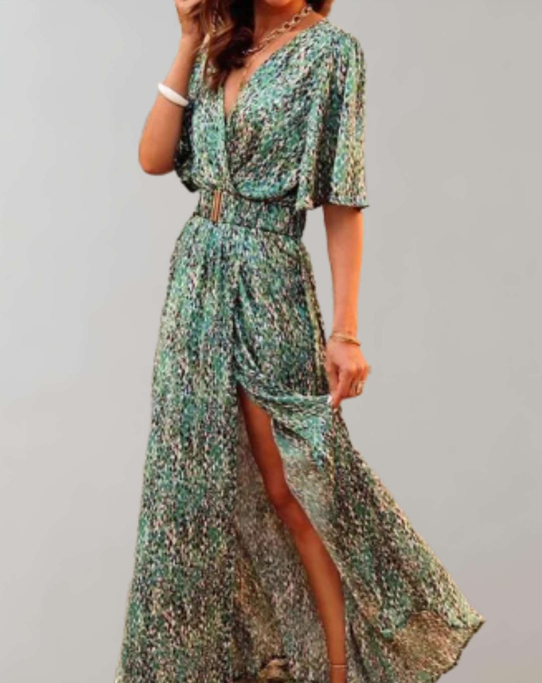 Women's floral wrap maxi dress with side slit, v-neck, and flowy fabric for summer and vacation wear.