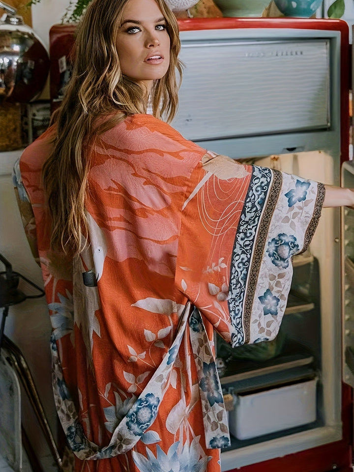 Elegant women's kimono with vibrant floral print, ideal resort wear & vacation fashion.