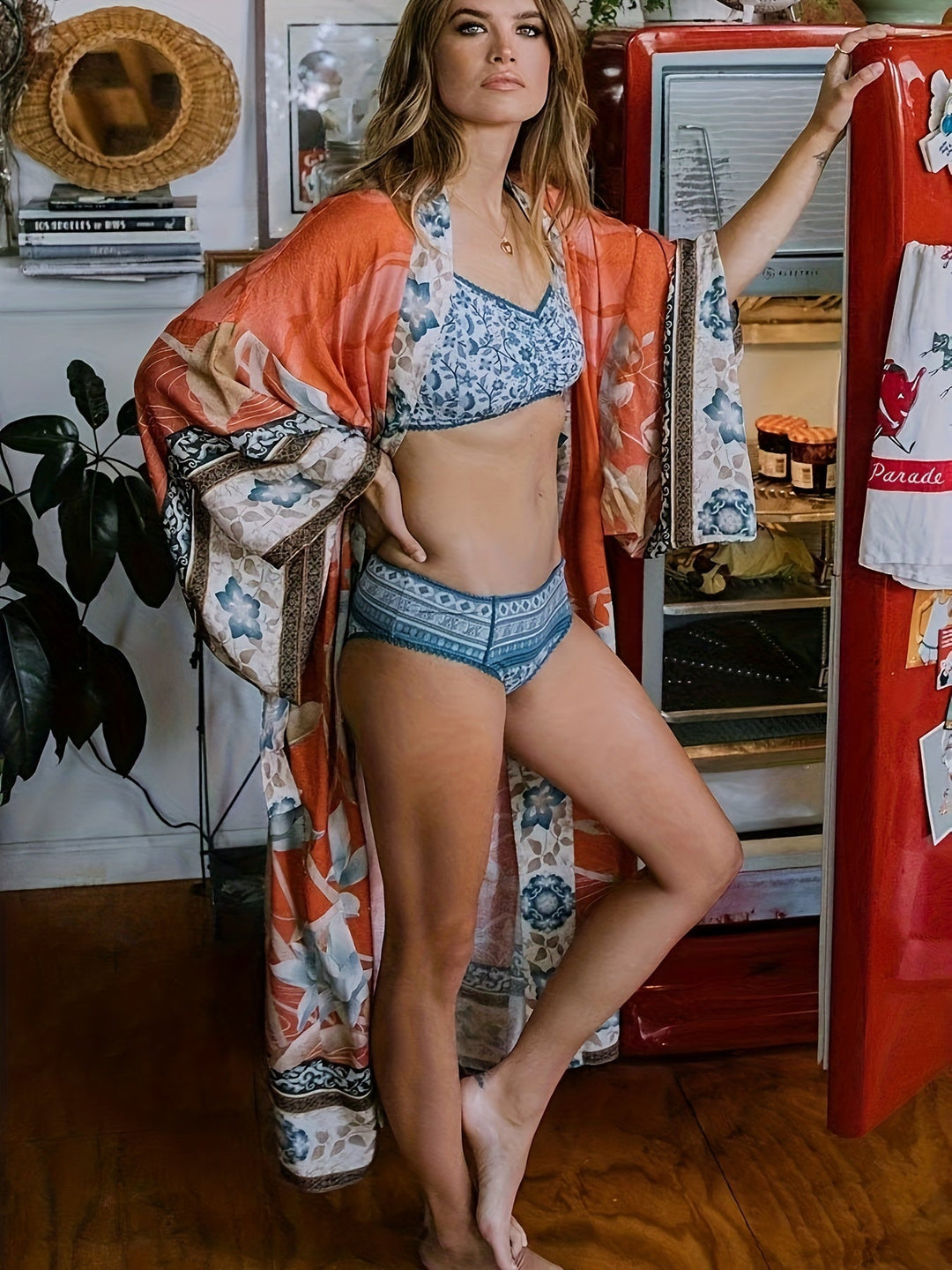 Stylish women's flowing floral print kimono, versatile for resort, beach, or casual summer outfits.
