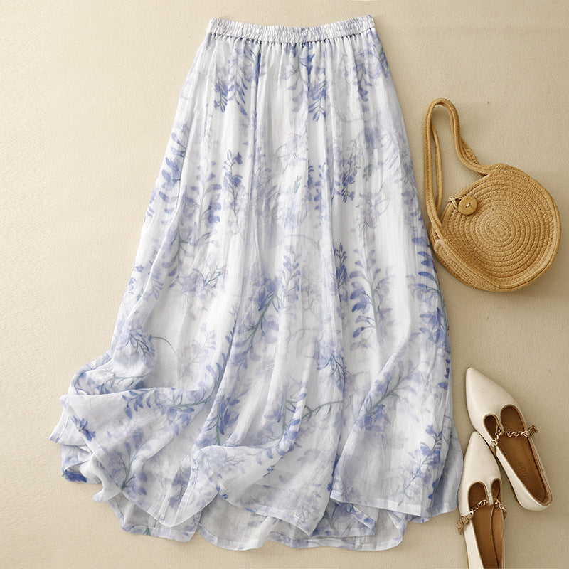 Women's flowing pleated midi skirt with an adjustable drawstring waist, perfect for casual summer boho style.