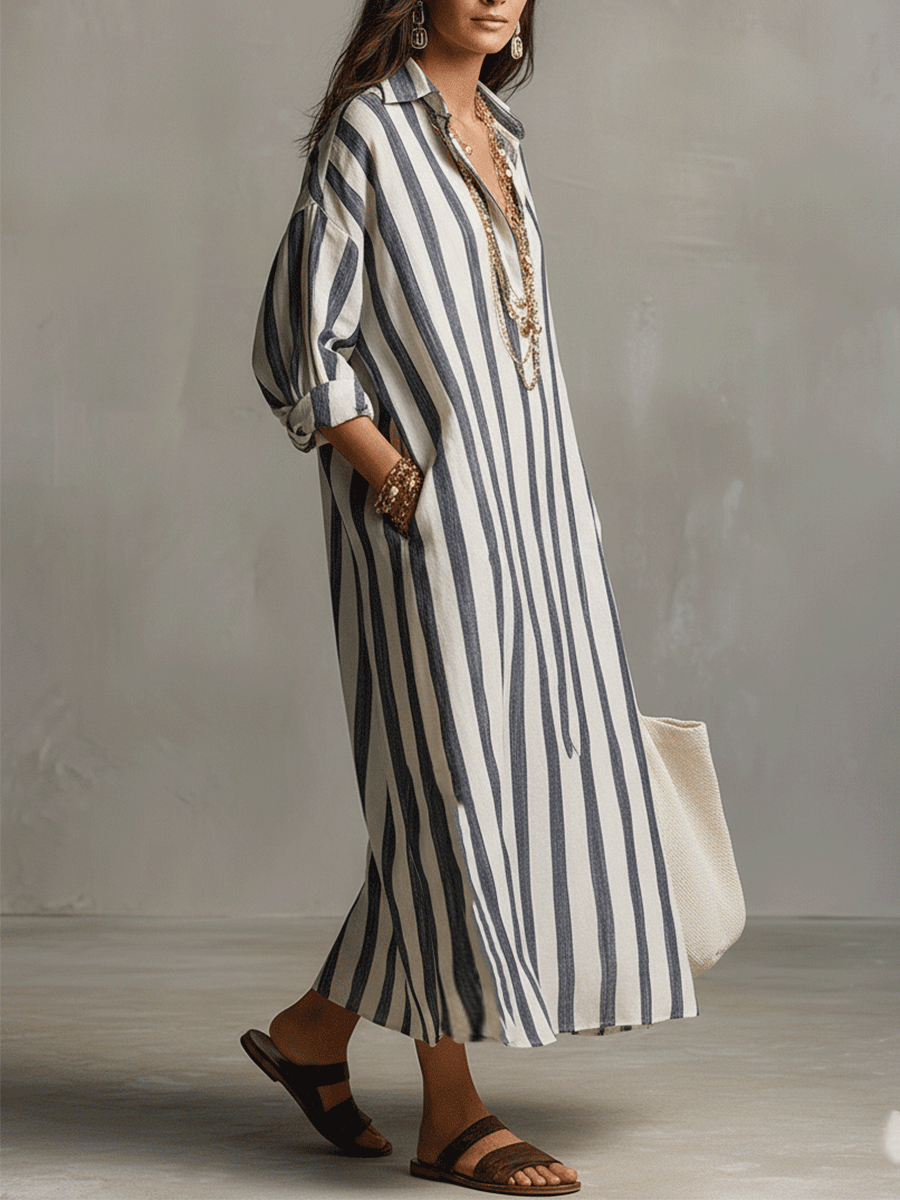 Women's long striped maxi dress in a bohemian style, perfect as a flowing summer beach or resort dress.