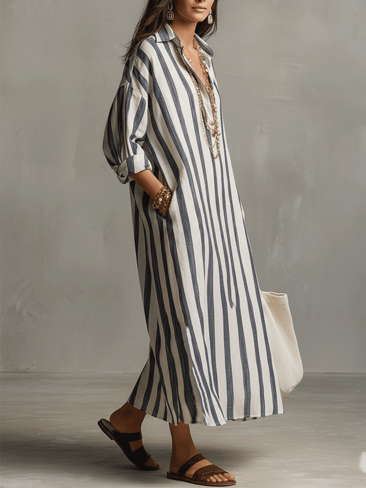 Women's long striped maxi dress in a bohemian style, perfect as a flowing summer beach or resort dress.