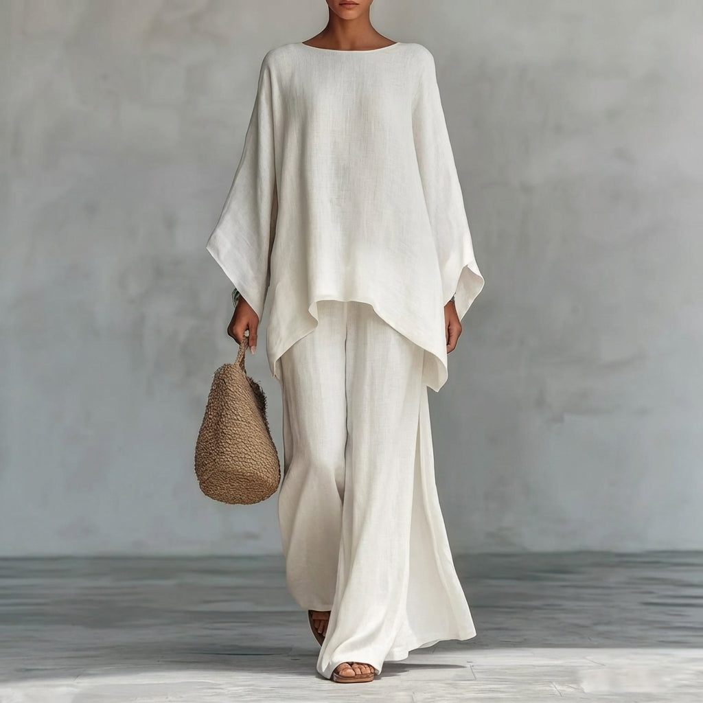 Boho chic women's two-piece flowing set with oversized tunic top and maxi skirt for summer fashion.