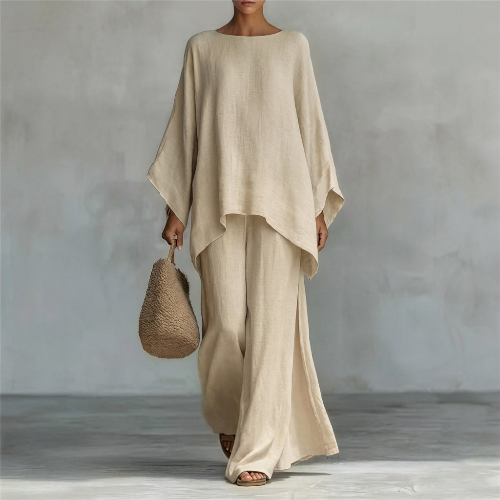 Relaxed fit women's two-piece set featuring a flowing tunic top and elegant maxi skirt for casual wear.