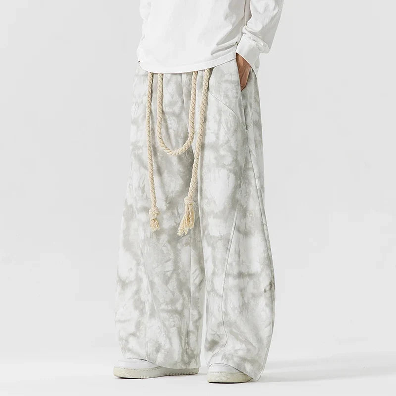 Textured women's wide-leg pants, featuring a chic rope belt for a versatile, casual look.