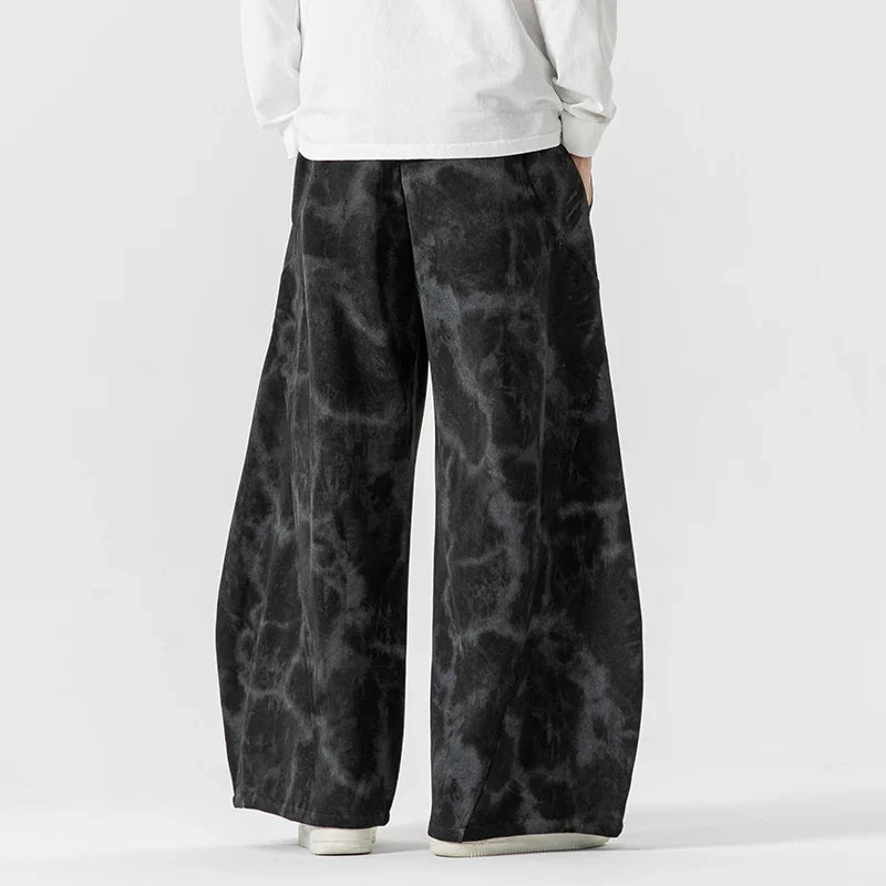Comfortable women's wide-leg pants with a relaxed fit and fashionable rope belt. Stylish casual wear.