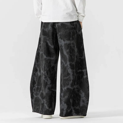 Comfortable women's wide-leg pants with a relaxed fit and fashionable rope belt. Stylish casual wear.