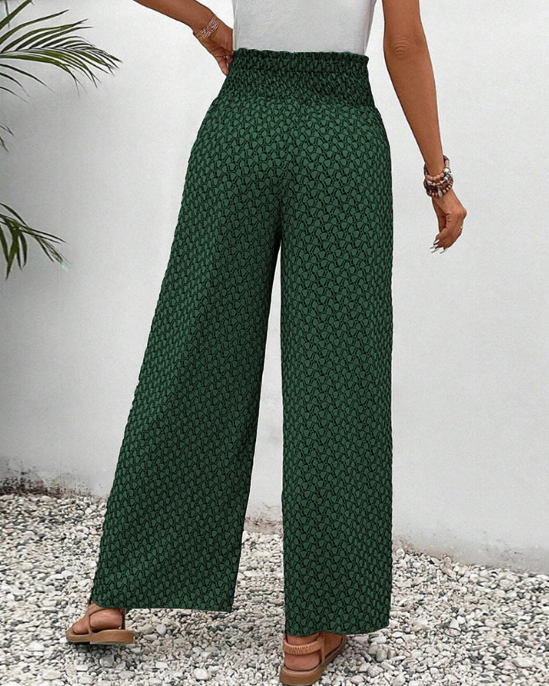 Comfortable women's relaxed fit wide leg trousers, combining flowy style with ease.