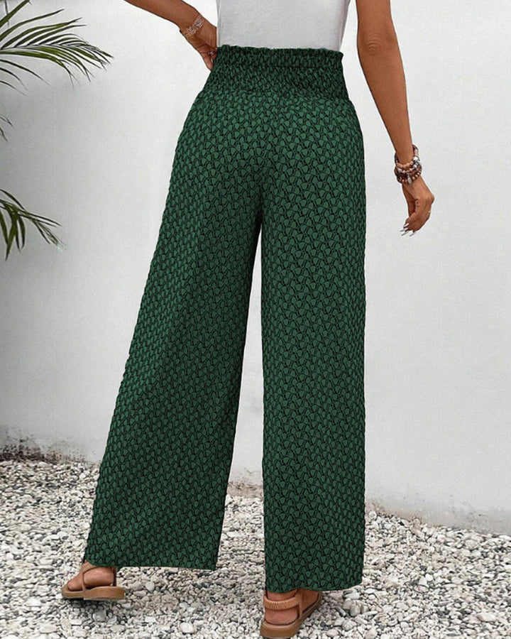 Comfortable women's relaxed fit wide leg trousers, combining flowy style with ease.