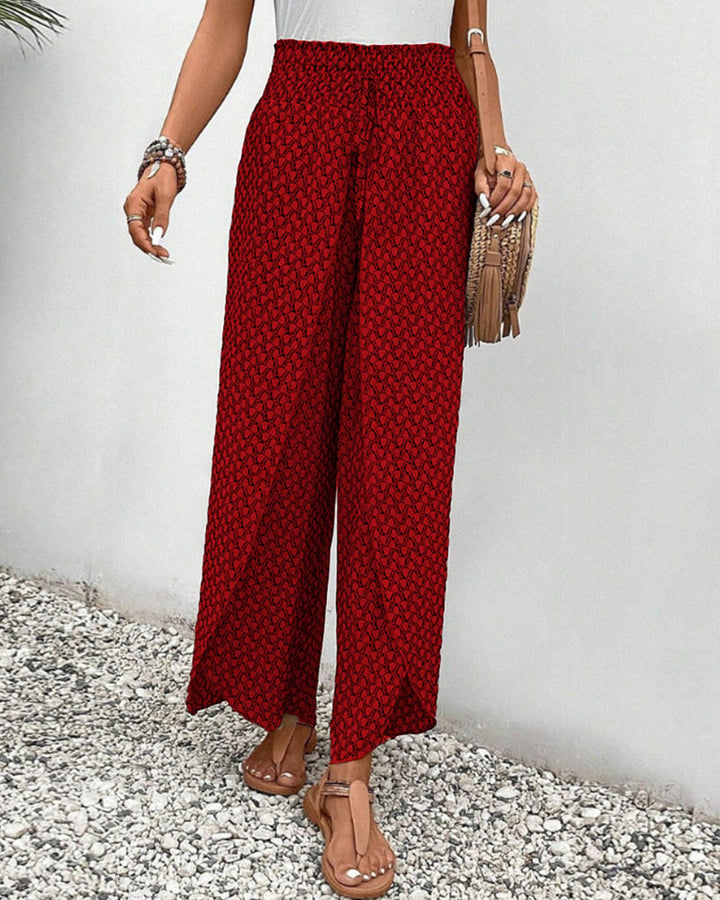 Relaxed fit women's flowing wide leg trousers, offering ultimate comfort and a flattering silhouette.