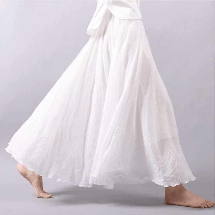 Women's flowy A-line maxi skirt in bohemian style, perfect for summer casual wear and beach days.