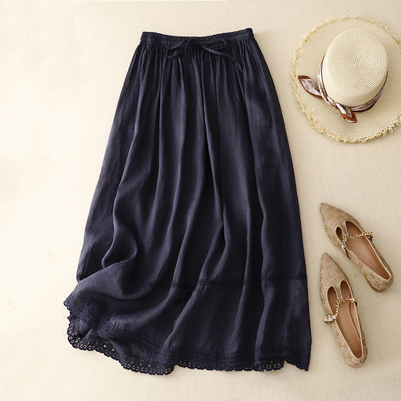 Graceful women's flowy A-line maxi skirt featuring delicate lace trim, a versatile piece for any wardrobe.