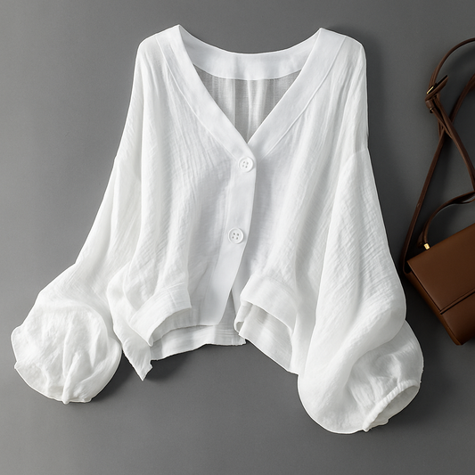 Women's flowy balloon sleeve blouse, a chic button-down top with relaxed fit, perfect for spring casual elegance.