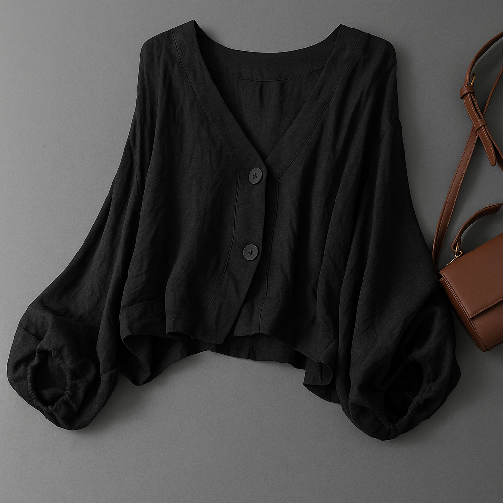 Comfortable women's flowy top with elegant balloon sleeves, versatile for summer casual wear or stylish work outfits.