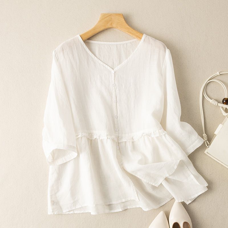 Lightweight summer blouse for women, featuring a flowy relaxed fit. Ideal for casual or chic looks. Effortless comfort.