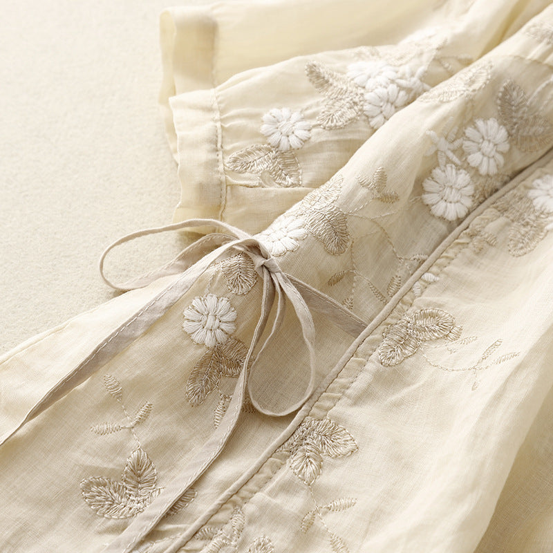 Stylish women's embroidered floral blouse, a flowy and comfortable bohemian summer top.