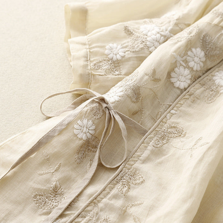 Stylish women's embroidered floral blouse, a flowy and comfortable bohemian summer top.