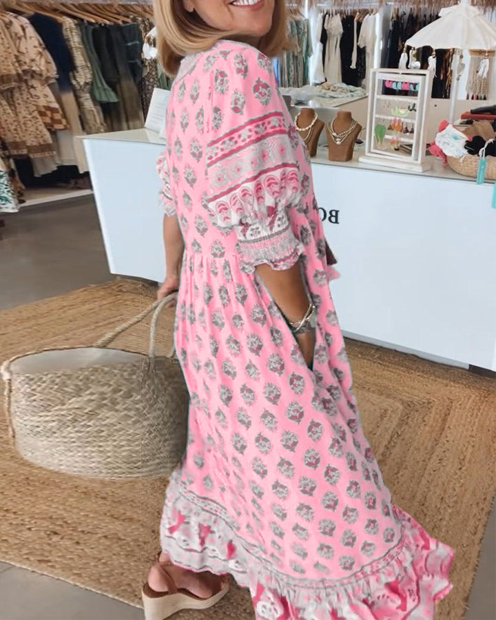 Women's casual spring/summer midi dress, flowy bohemian style, with elegant lantern sleeves.