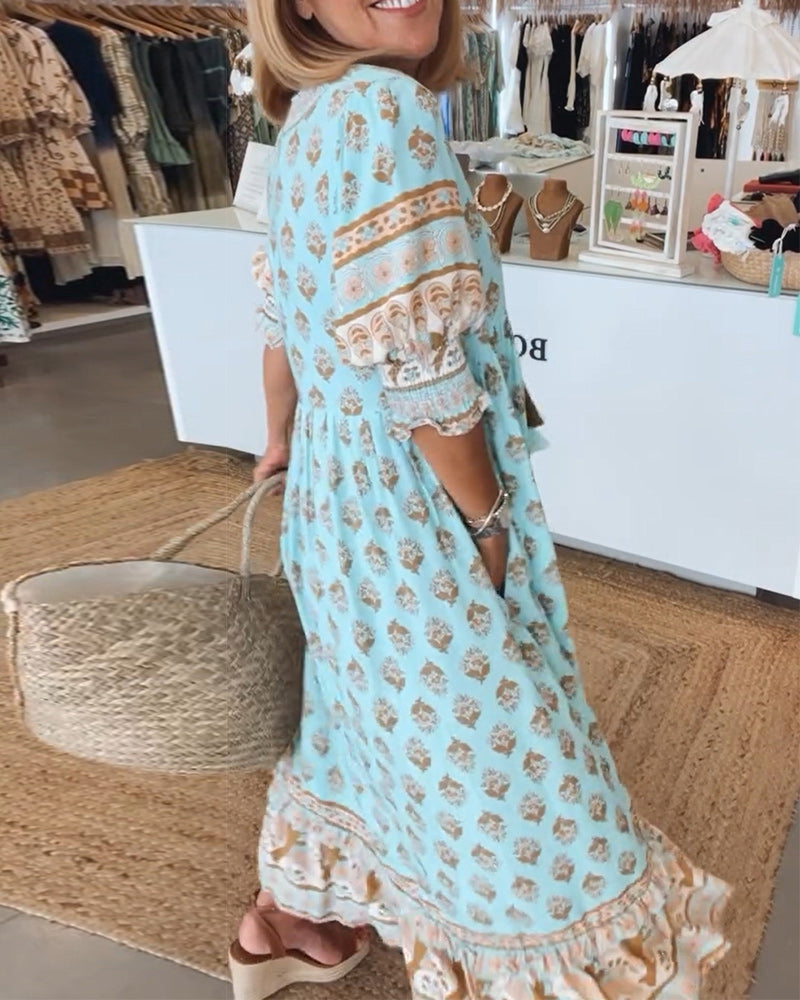 Casual women's bohemian midi dress featuring a V-neck, flowy skirt, and practical side pockets.
