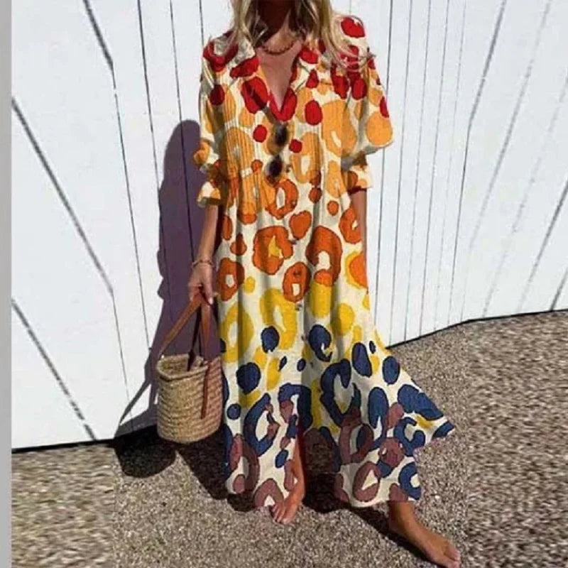 Close-up of a lightweight, comfortable women's flowy summer dress with delicate boho floral patterns.