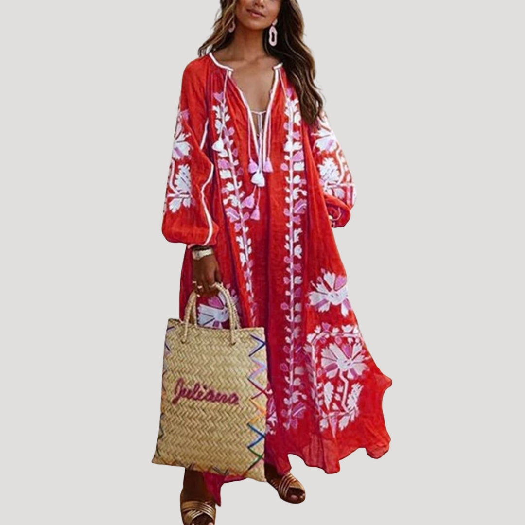 Women's flowy boho maxi dress with V-neck, long sleeves, and a vibrant pattern. Perfect for casual summer wear.