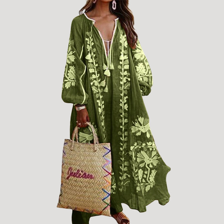 Comfortable women's patterned flowy maxi dress. V-neck, long sleeves, and bohemian style make it versatile for any season.