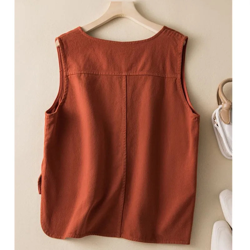 Women's soft cotton blend vest, flowy design for comfortable layering. Sleeveless & breathable top.