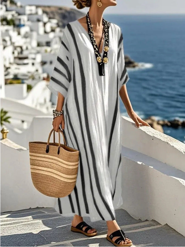 Versatile women's flowy kaftan dress, perfect as a resort maxi dress, beach cover-up, or casual summer wear.