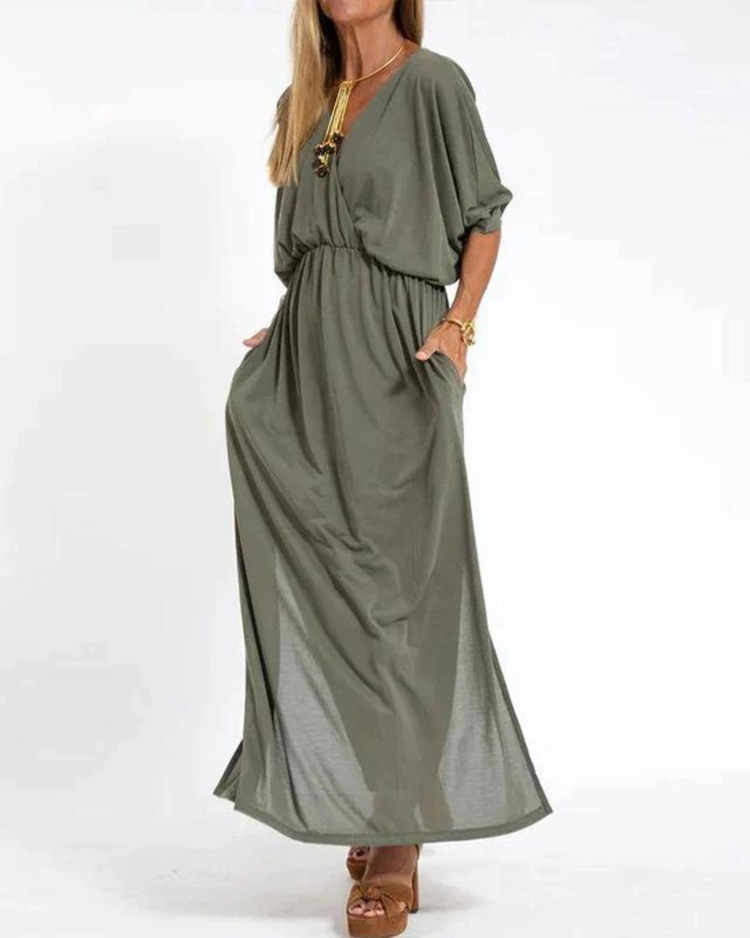 Women's flowy long maxi dress with adjustable spaghetti straps, perfect for a chic casual summer look.