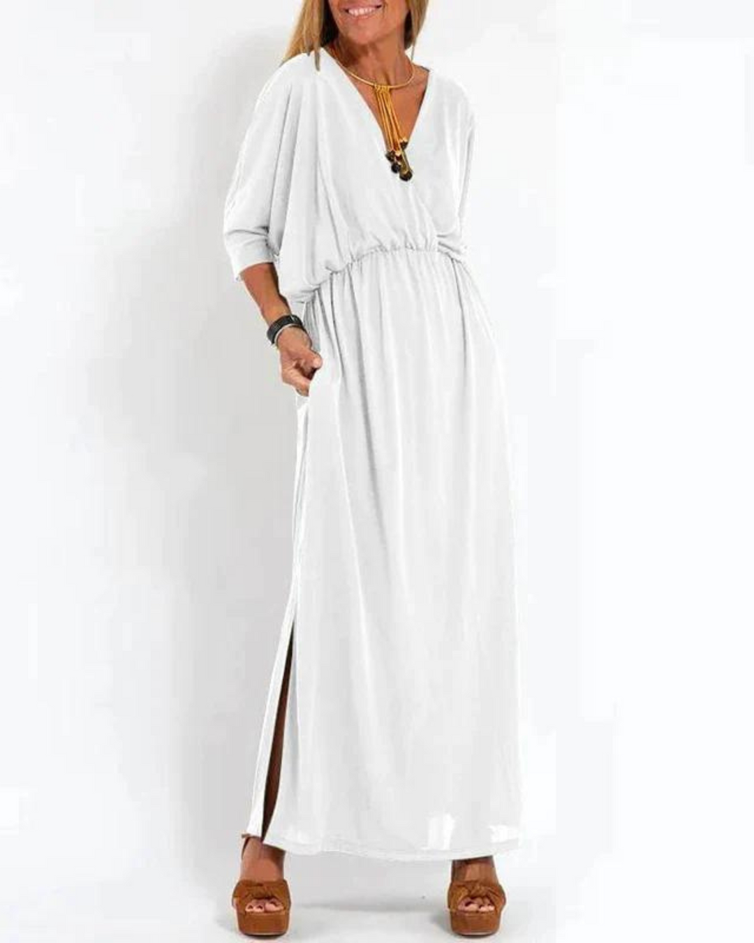 Stylish women's long summer dress with a flattering flowy silhouette and easily adjustable thin straps for perfect fit.