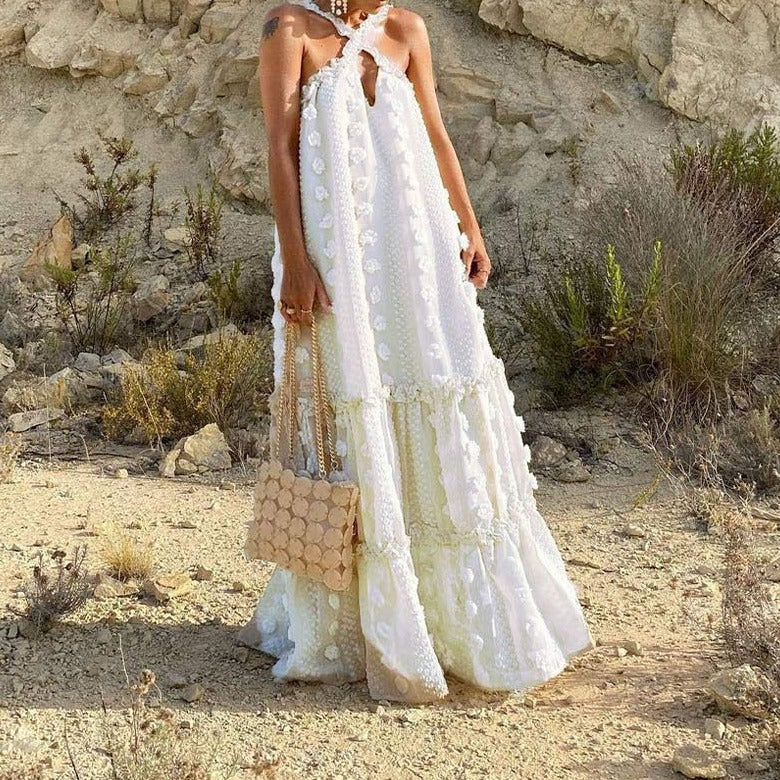 Long, flowy women's maxi dress. Effortless summer style, ideal for vacation, beach, or casual outings.