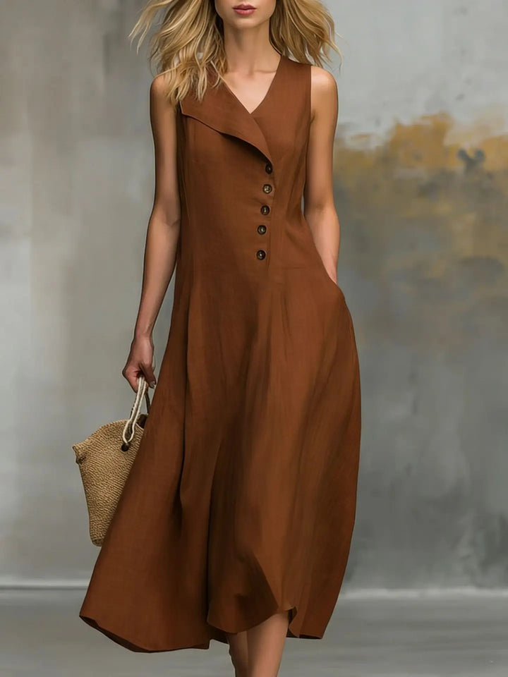 Chic women's flowy sleeveless midi dress, ideal for summer style with an asymmetrical button design.