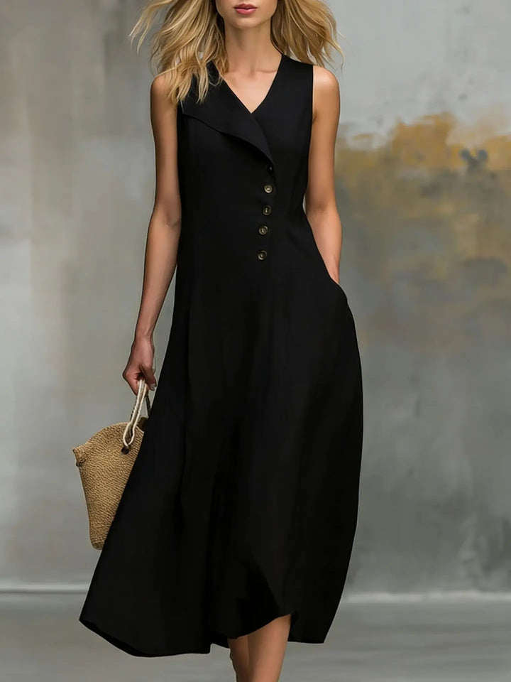 Stylish women's sleeveless midi dress, a relaxed fit flowy design with intricate asymmetrical button detail.