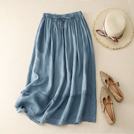 Women's flowy midi skirt with elegant scalloped lace hem. Perfect for summer, beach, or casual wear.