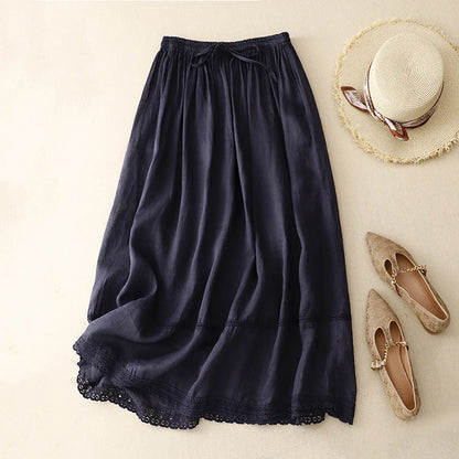 Casual yet elegant women's midi skirt, flowy design, and a distinctive scalloped lace hem for a stylish summer look.